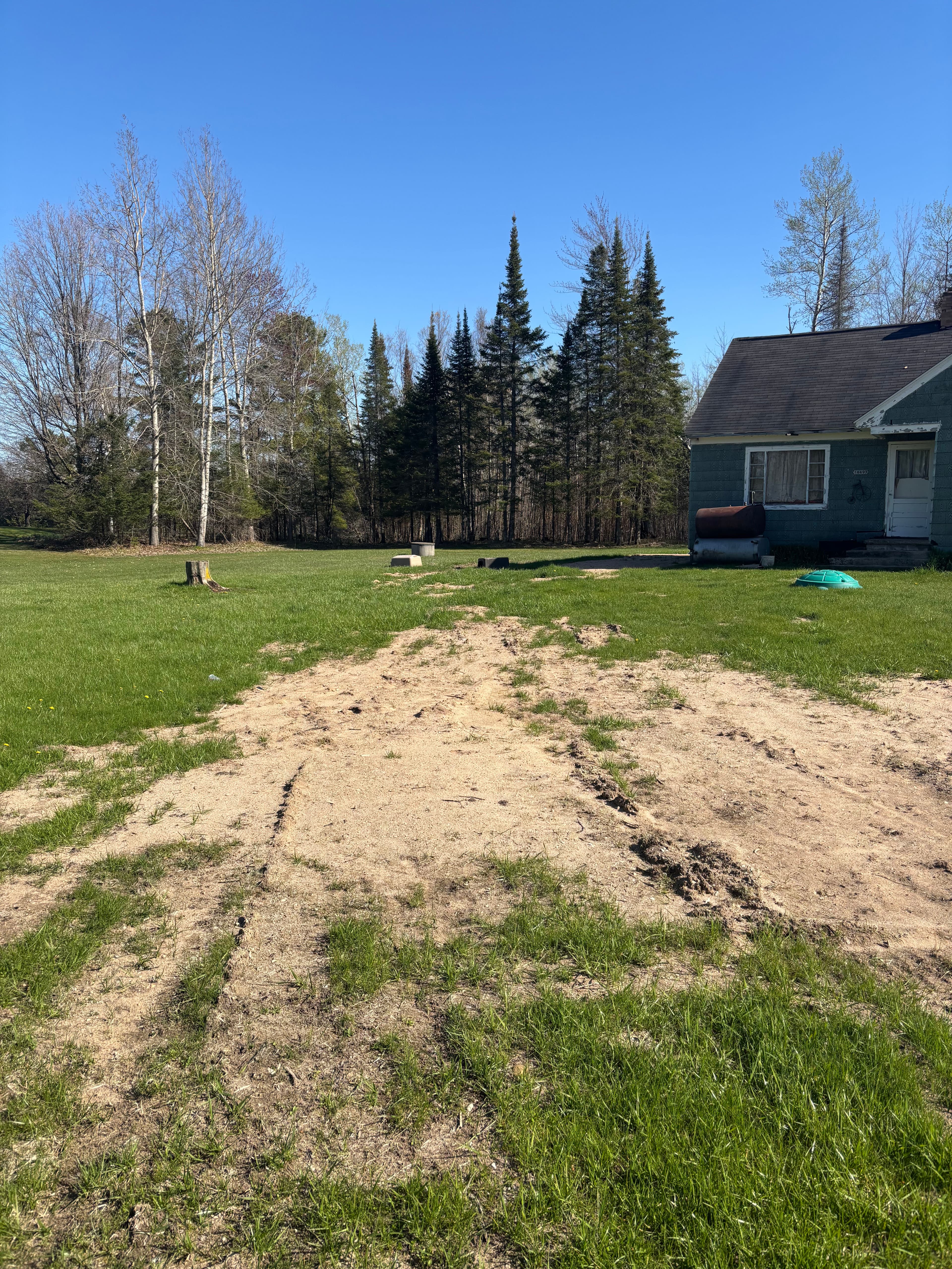 Project Fresh Grade and Hydroseeding Gets This Rapid River Lawn Started Right image