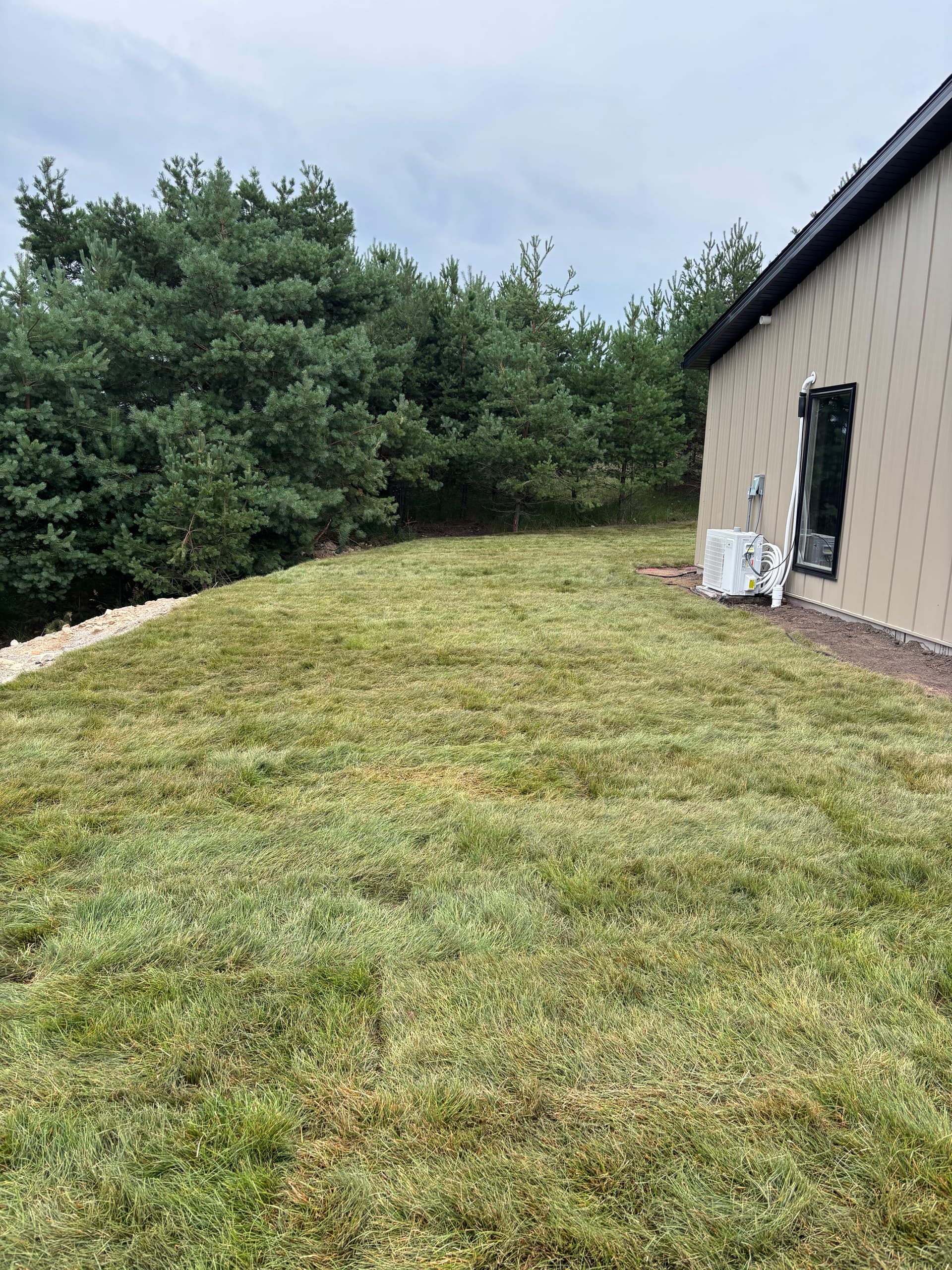Gallery photos for Slope Washout Fixed With Stone, Drainage, and Fresh Sod: Image #6